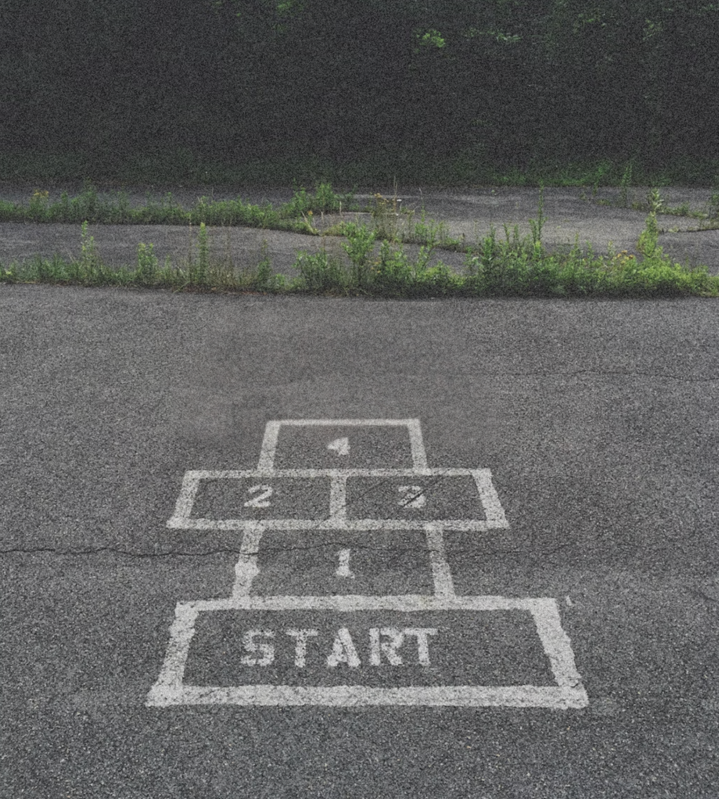 Hopscotch outline on pavement labeled ‘Start,’ symbolizing the first step in The Four Phases HTMA Program and the beginning of rebuilding energy and restoring balance naturally.